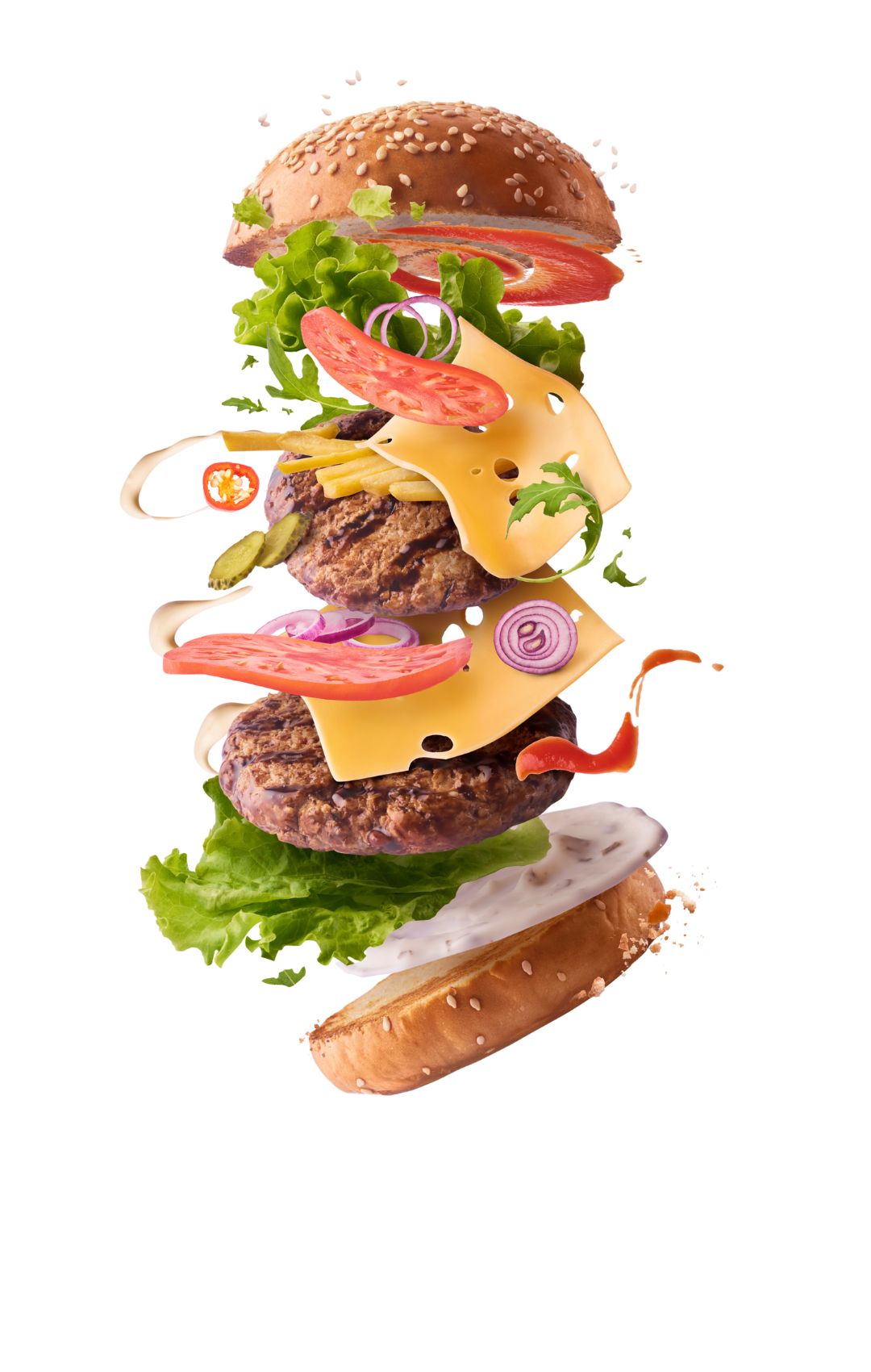 Delicious burger with flying ingredients